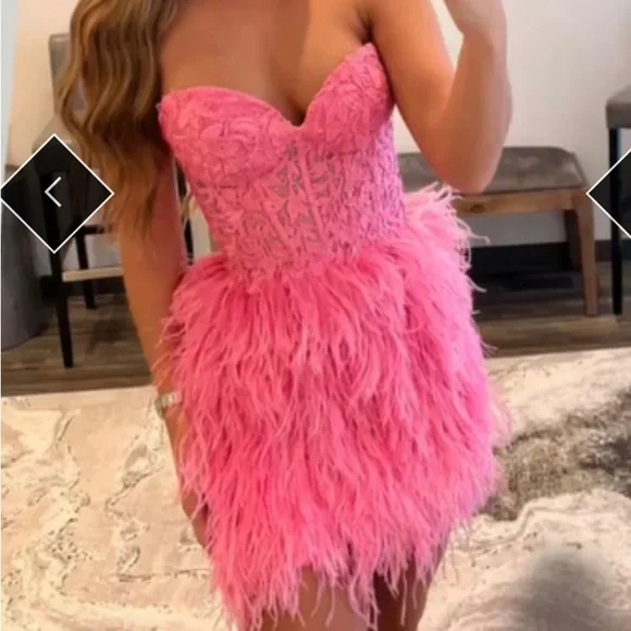 New never worn size short feather pink dress